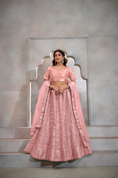 Lehenga Choli pêche en tulle avec broderies de fils et sequins