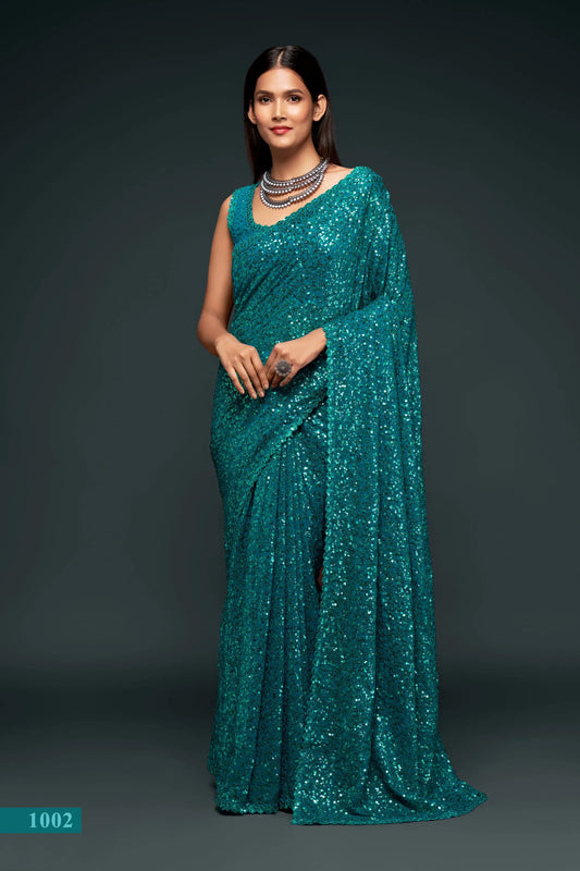 Lagoon blue georgette sari with thread embroidery and multiple sequins NAYA COLLECTION