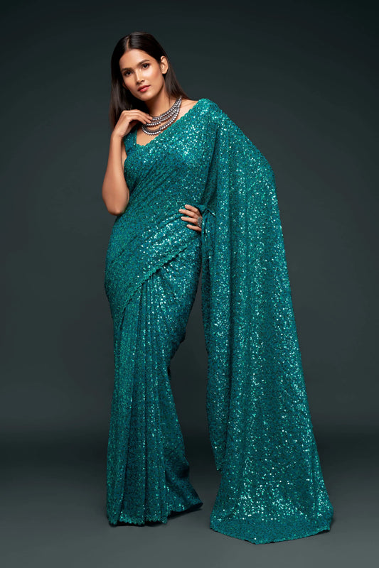 Lagoon blue georgette sari with thread embroidery and multiple sequins NAYA COLLECTION