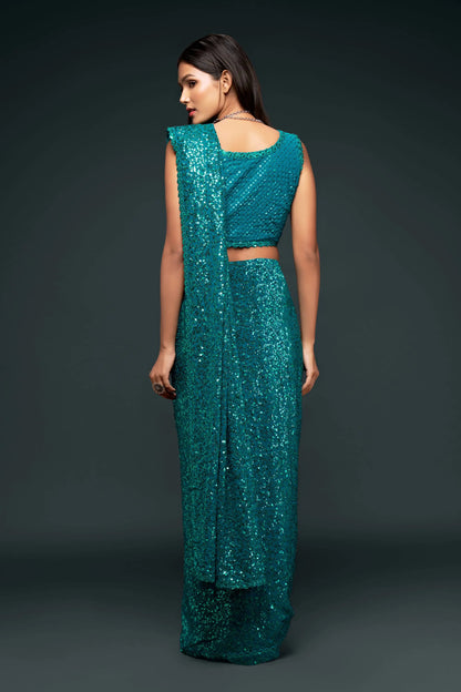 Lagoon blue georgette sari with thread embroidery and multiple sequins NAYA COLLECTION