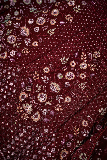Lehenga Choli en filet bordeaux avec broderie au fil et sequins