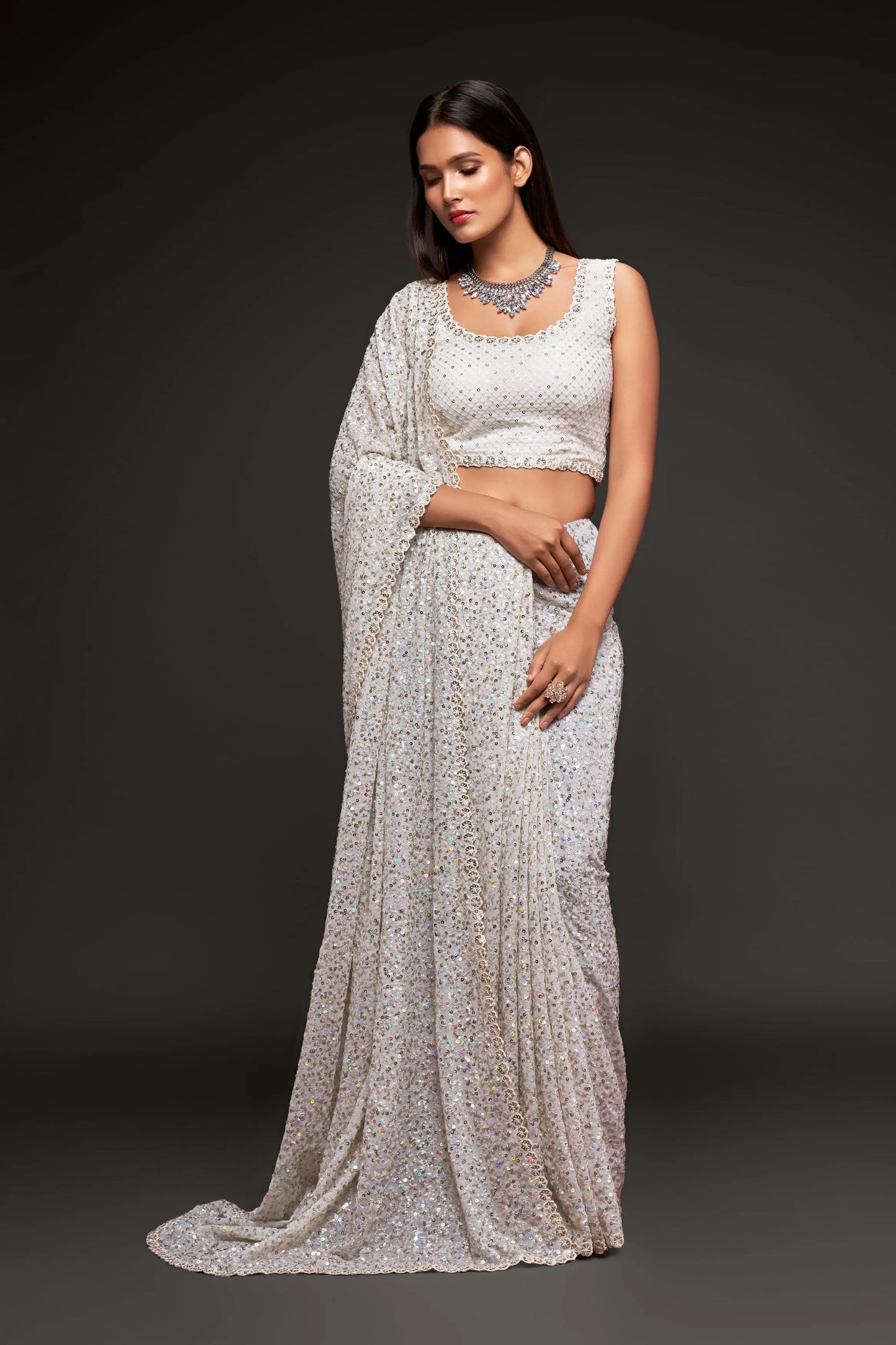 Pearly white georgette sari with thread embroidery and multiple sequins NAYA COLLECTION