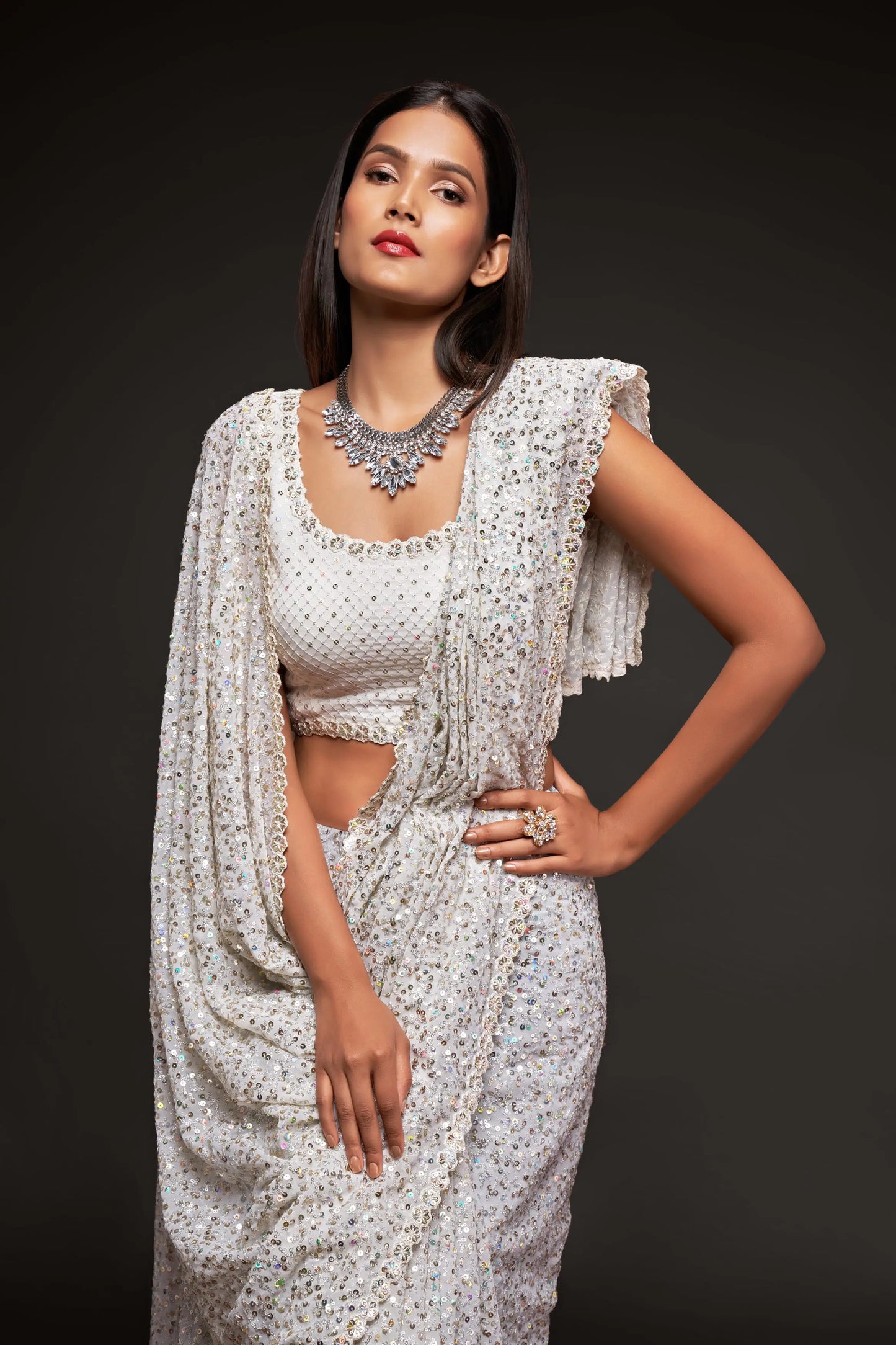 Pearly white georgette sari with thread embroidery and multiple sequins NAYA COLLECTION