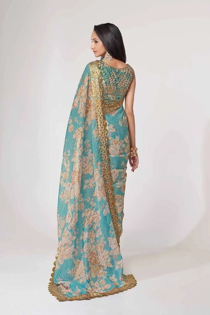 Sari en organza bleu ciel à imprimé floral avec travail de sequins