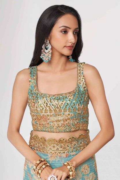 Sari en organza bleu ciel à imprimé floral avec travail de sequins