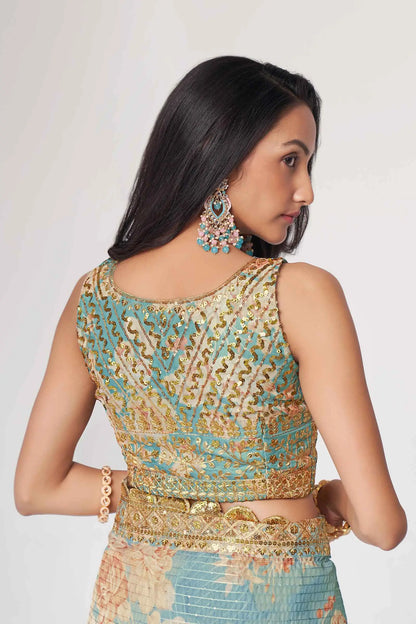 Sari en organza bleu ciel à imprimé floral avec travail de sequins