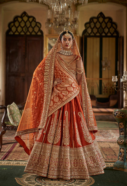 Lehenga de mariée orange foncé riche inspiration de créateur COLLECTION SAJYA
