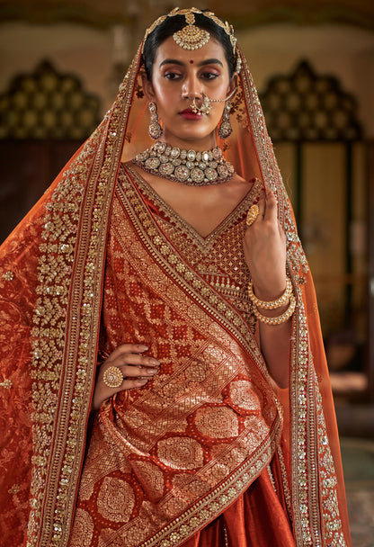 Lehenga de mariée orange foncé riche inspiration de créateur COLLECTION SAJYA
