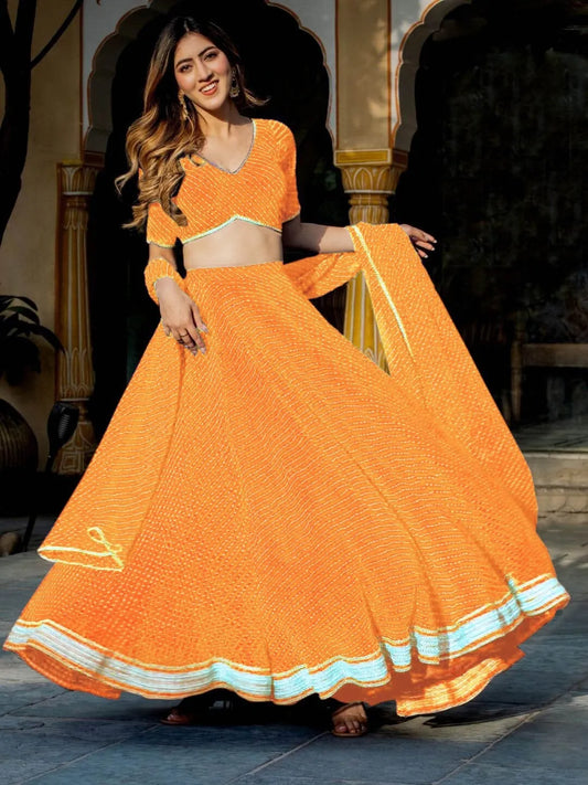Gorgeous Yellow Georgette Lehenga with Leheriya Print, Adorned with Zari Embroidery and Cording Lace