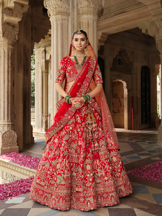 Lehenga de mariée rouge avec détails de broderies dorées et motifs COLLECTION MAHIYA