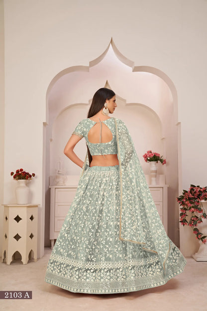 Lehenga Choli turquoise vert en filet avec broderie en fil de coton blanc, travail de zari et sequins