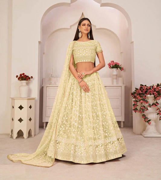 Lehenga Choli jaune citron en filet avec broderie en fil de coton blanc, travail de zari et sequins