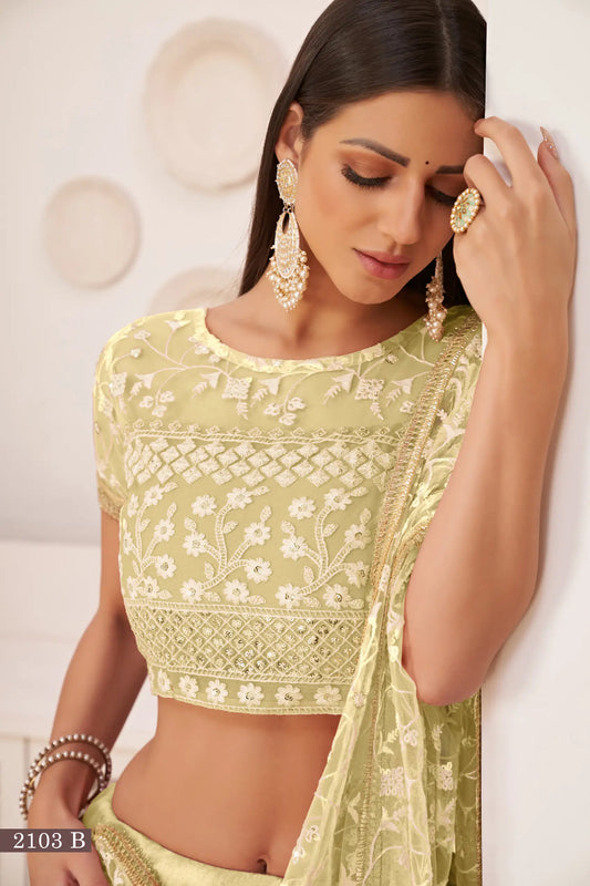 Lehenga Choli jaune citron en filet avec broderie en fil de coton blanc, travail de zari et sequins