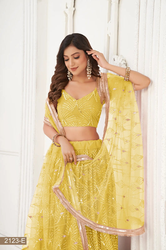 Gelbes Netz-Lehenga-Choli mit Fadenstickerei, Spiegelarbeit und Paillettenstickerei