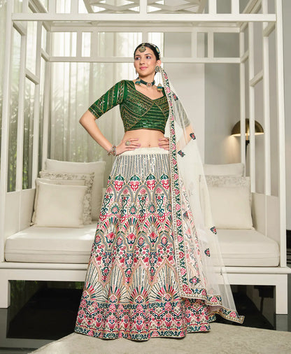 White and green silk lehenga choli with thread embroidery and sequins