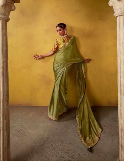 Olive green glass silk fabric sari with multi-colored orange blouse with digital print, sequin and thread embroidery