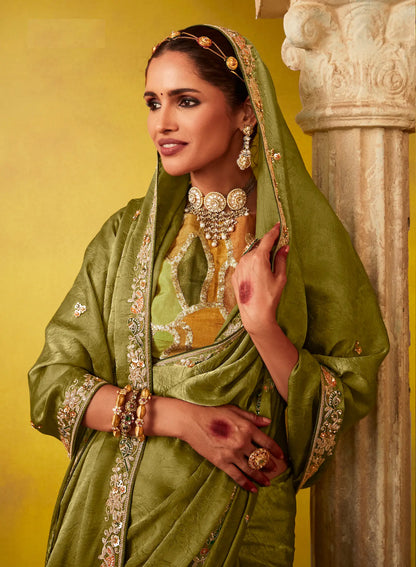 Olive green glass silk fabric sari with multi-colored orange blouse with digital print, sequin and thread embroidery