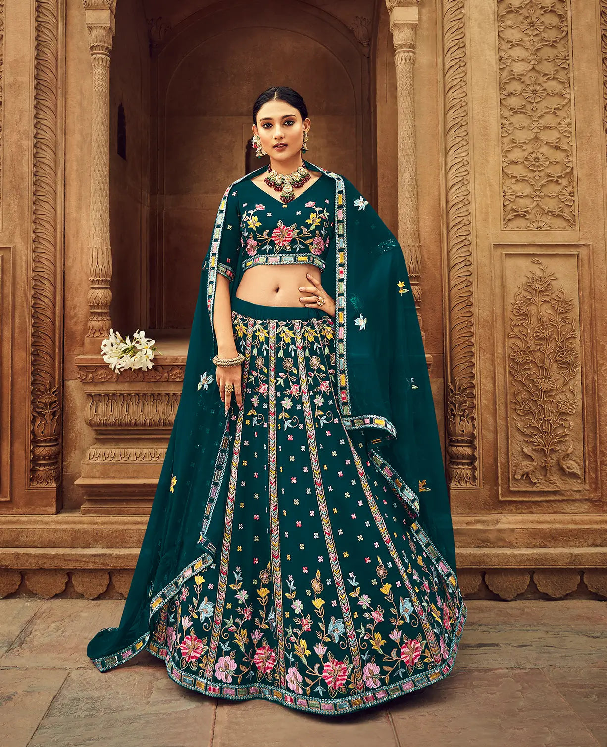Rich teal blue georgette lehenga choli with thread embroidery and sequins
