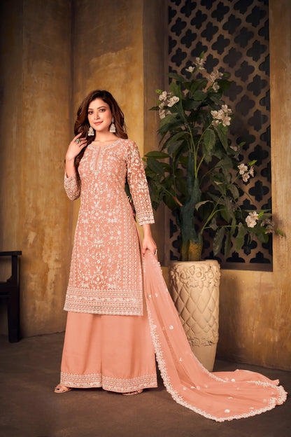 Salwar suit en filet pêche avec broderie au fil et sequins