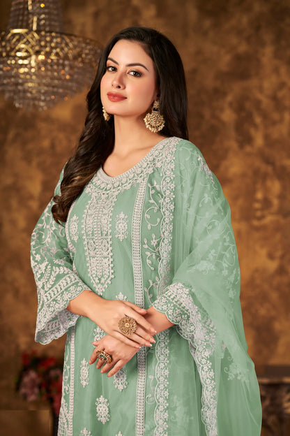 Salwar suit en filet vert pistache avec broderie au fil et sequins