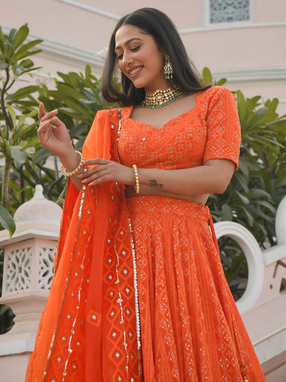 Lehenga orange léger en georgette avec travail traditionnel