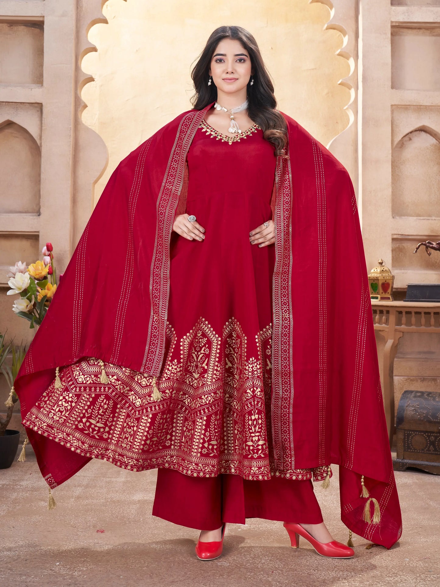 Red silk salwar suit with mirror work and foil print