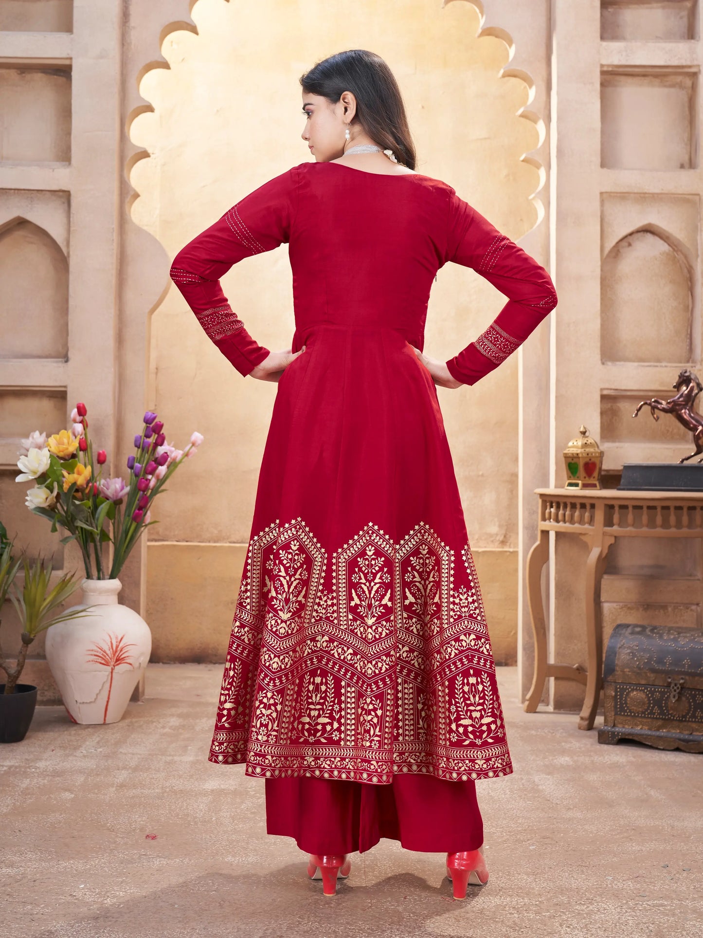 Red silk salwar suit with mirror work and foil print