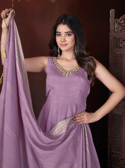 Pale purple silk salwar suit with mirror work and foil print