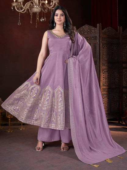 Pale purple silk salwar suit with mirror work and foil print