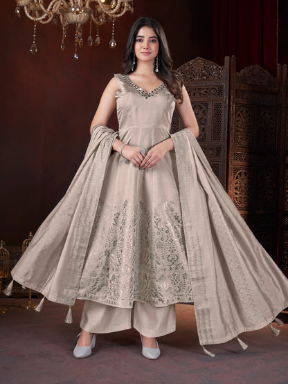 Ivory-cream salwar suit with mirror work and foil print