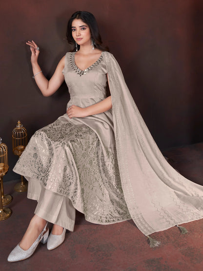 Ivory-cream salwar suit with mirror work and foil print