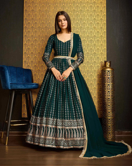 Dark green georgette dress with metallic foil work, accompanied by a dupatta