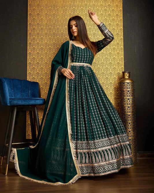 Dark green georgette dress with metallic foil work, accompanied by a dupatta