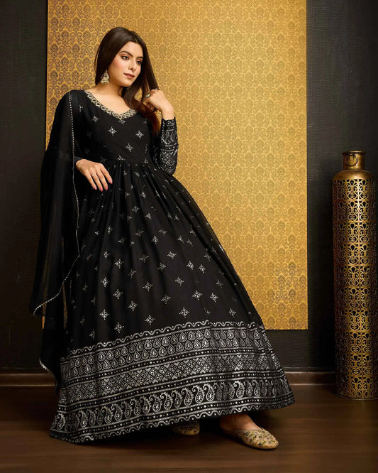 Black georgette dress with metallic foil work, accompanied by a dupatta