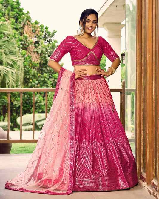 Lehenga choli pêche et rose avec broderies en fil et sequins