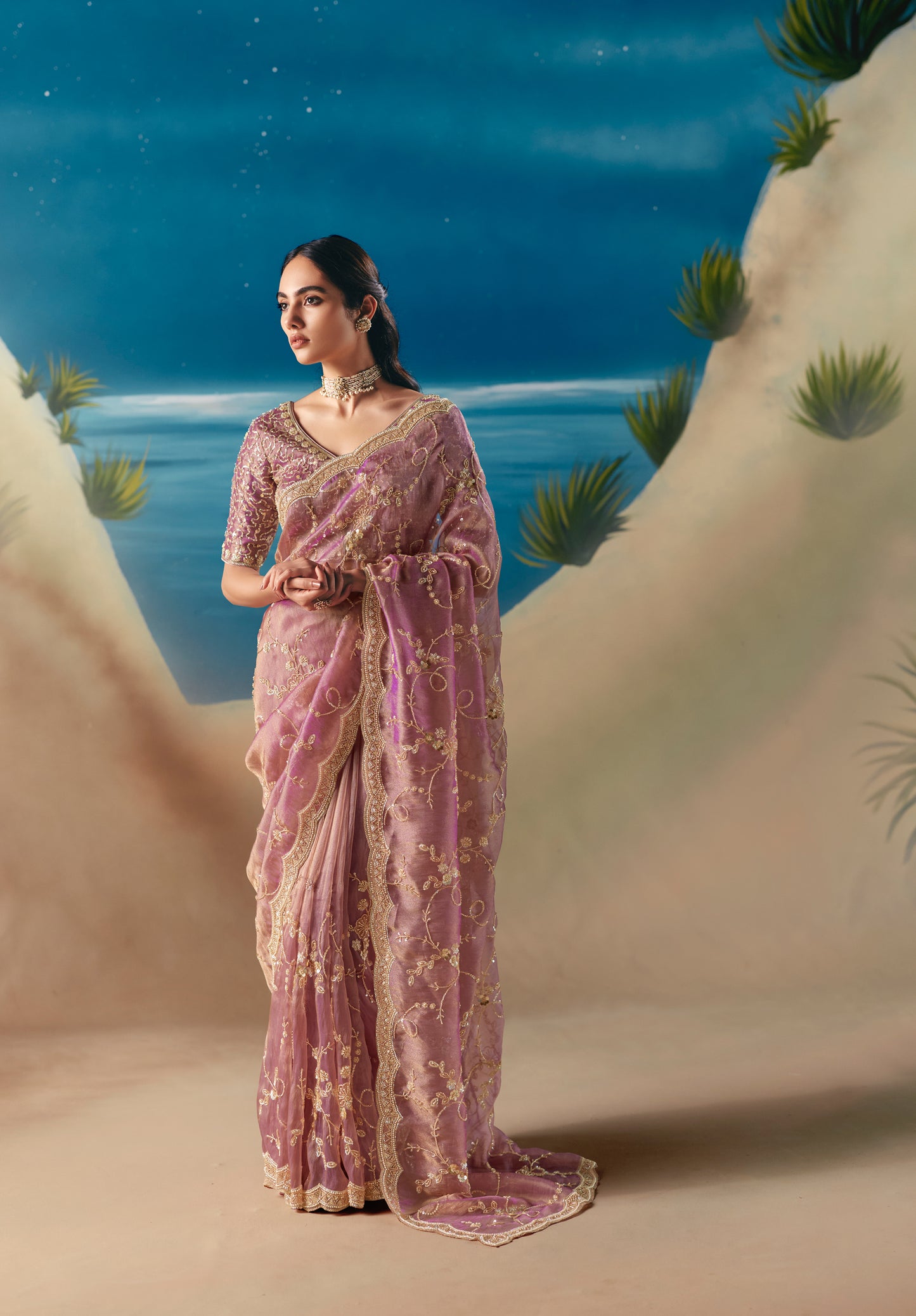 Green glass silk sari with multi-colored red floral blouse and digital print, sequin and thread embroidery