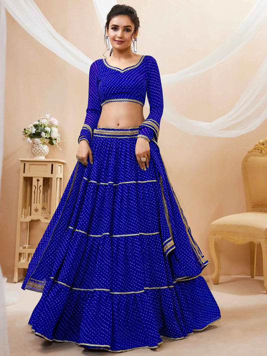 Lehenga bleu en georgette avec imprimé Leheriya et travail de dentelle sur toute la surface