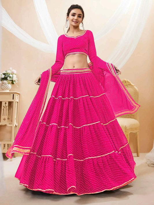 Lehenga rose en georgette avec imprimé Leheriya et travail de dentelle sur toute la surface