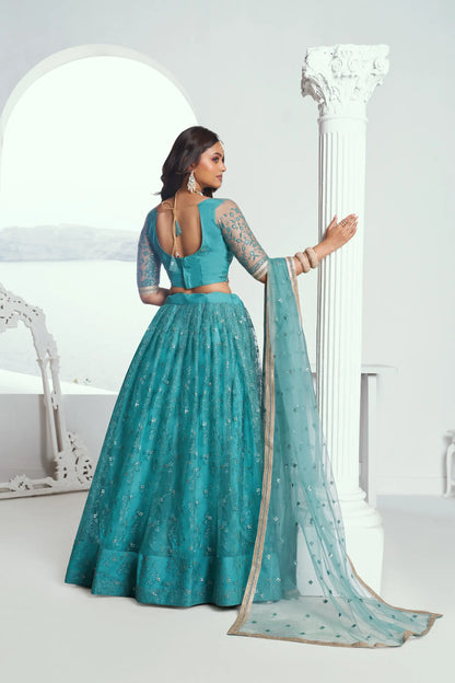 Lehenga Choli bleu turquoise en résille avec broderie au fil de coton et sequins COLLECTION CHANDRALEKHA