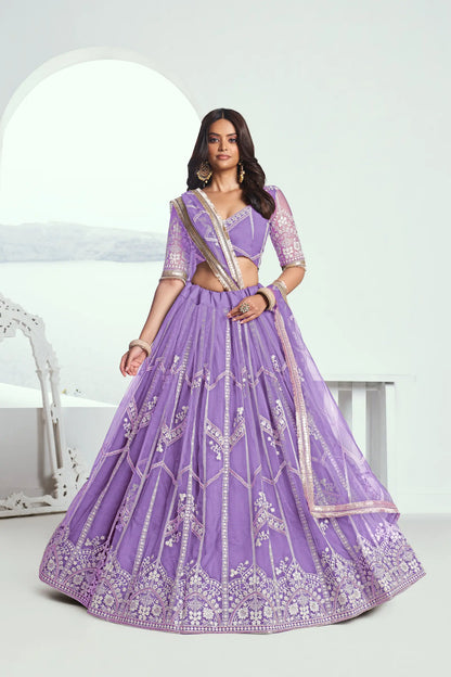 Lavender purple Lehenga Choli set in net fabric, adorned with delicate cotton thread embroidery and shimmering sequins CHANDRALEKHA COLLECTION