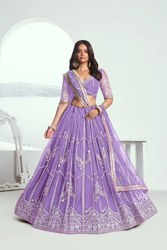 Lavender purple Lehenga Choli set in net fabric, adorned with delicate cotton thread embroidery and shimmering sequins CHANDRALEKHA COLLECTION