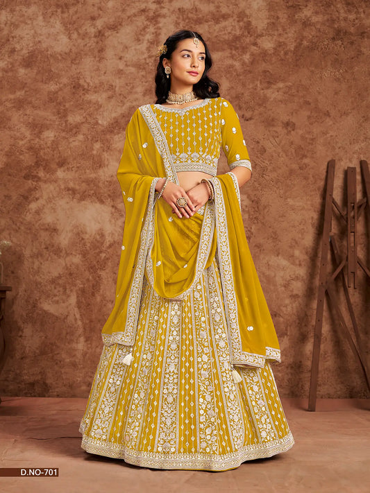 Designer Lehenga Choli gelb aus Kunstgeorgette mit Fadenstickerei und Pailletten