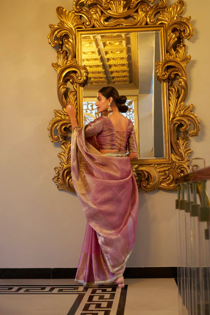 Light pink shiny silk sari with zari weaving work and sequin lace border