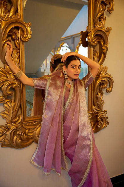 Light pink shiny silk sari with zari weaving work and sequin lace border