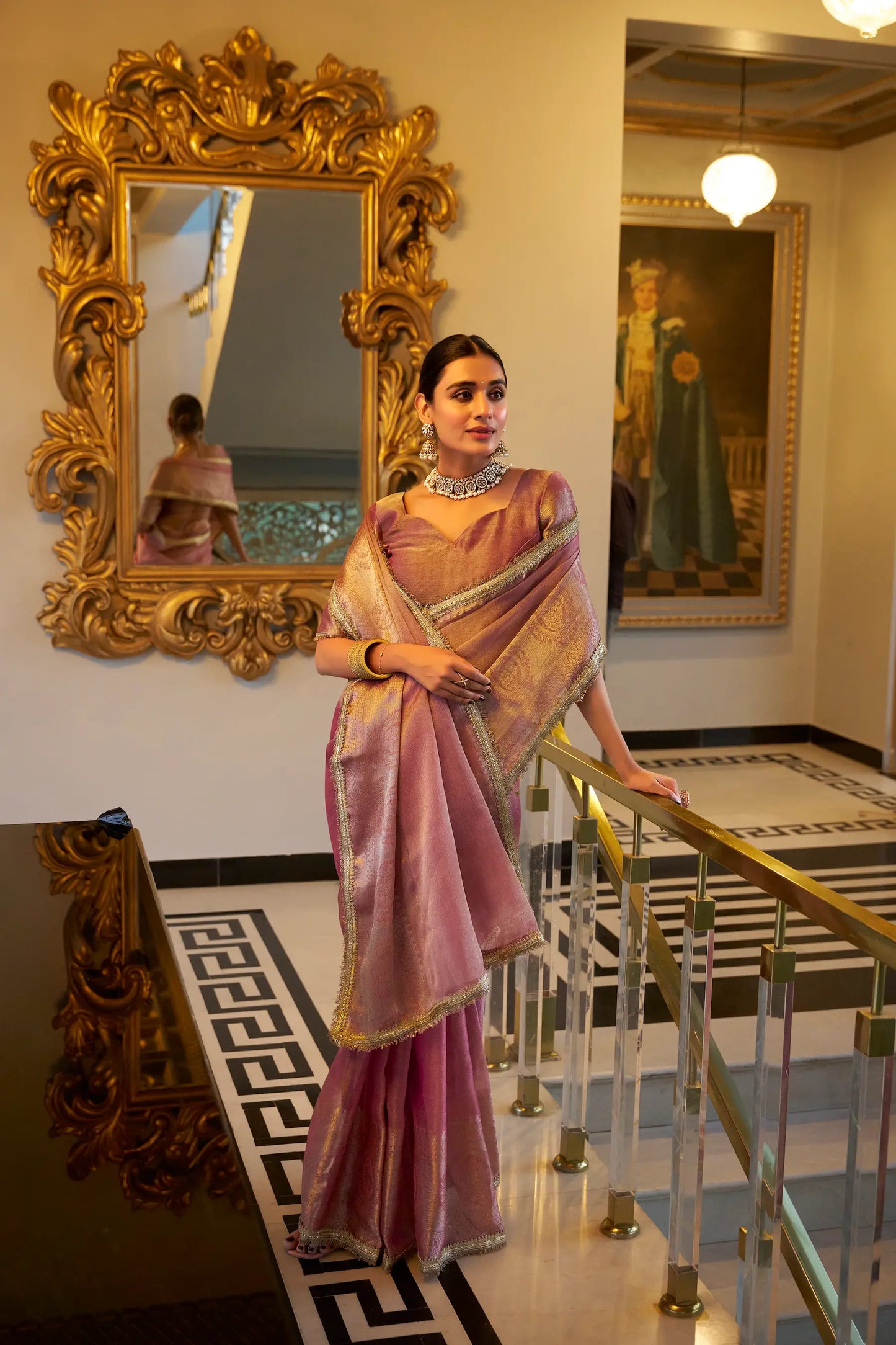 Light pink shiny silk sari with zari weaving work and sequin lace border