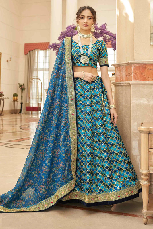Designer Lehenga Choli Blau mit Fadenstickerei, Zari, Dori und Pailletten auf Kunstseide KAMYA COLLECTION DESIGNER INSPIRATION