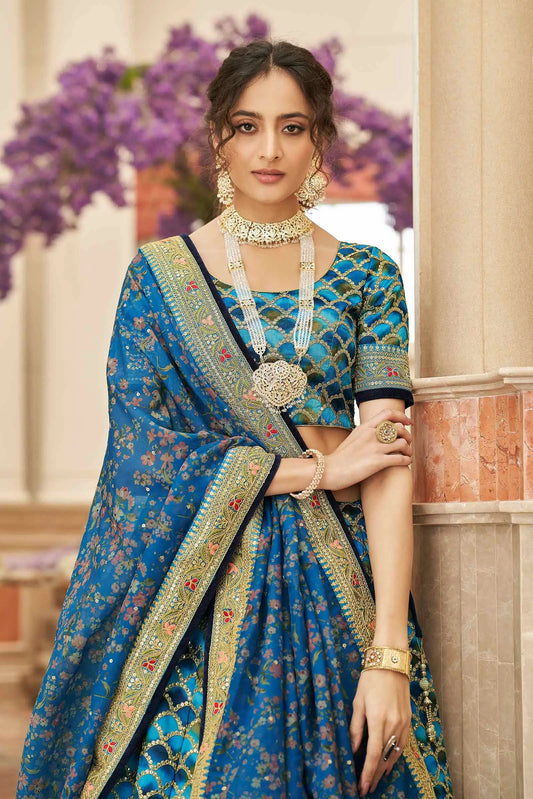 Designer Lehenga Choli Blau mit Fadenstickerei, Zari, Dori und Pailletten auf Kunstseide KAMYA COLLECTION DESIGNER INSPIRATION