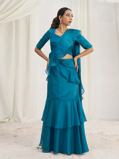 Sari de soirée en organza bleu-vert avec broderies artisanales