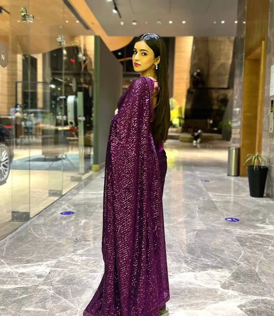 Dark purple georgette sari with sequin embroidery and dori border