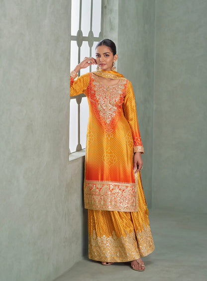 Salwar Palazzo en soie chinon avec broderies et motifs jaune soleil et orange bicolore COLLECTION AMREEN